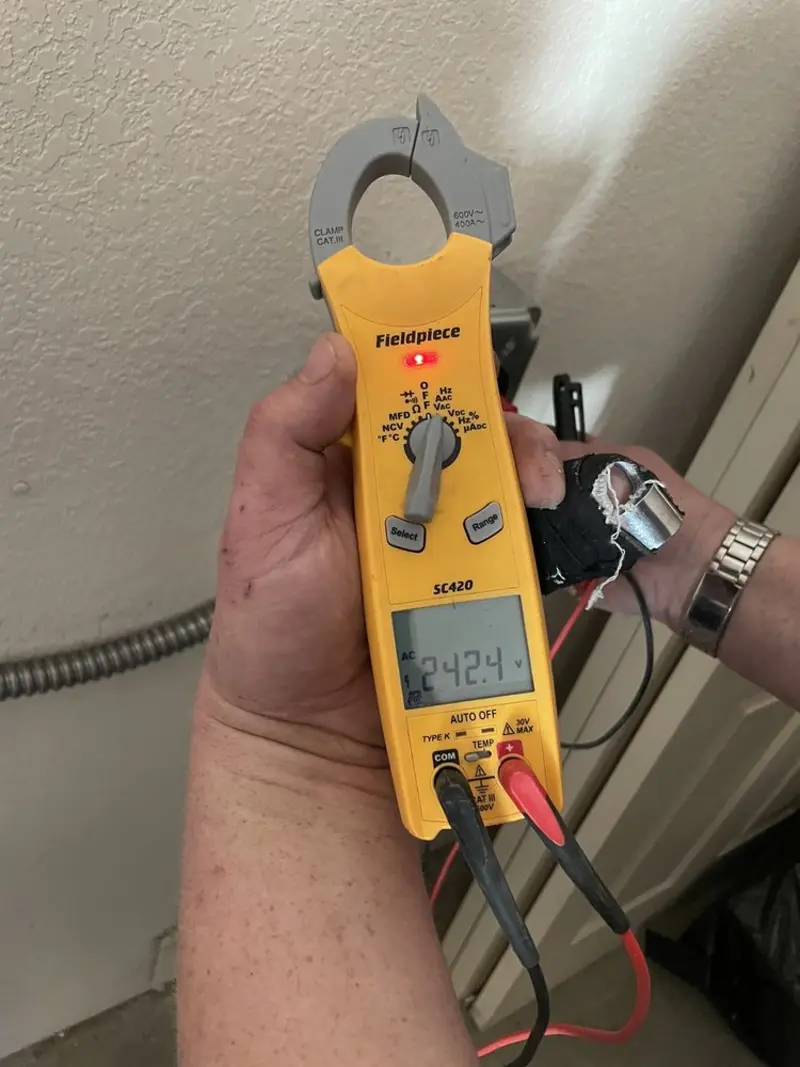 Voltage testing with clamp meter during Outlet Installation in Morgan Hill